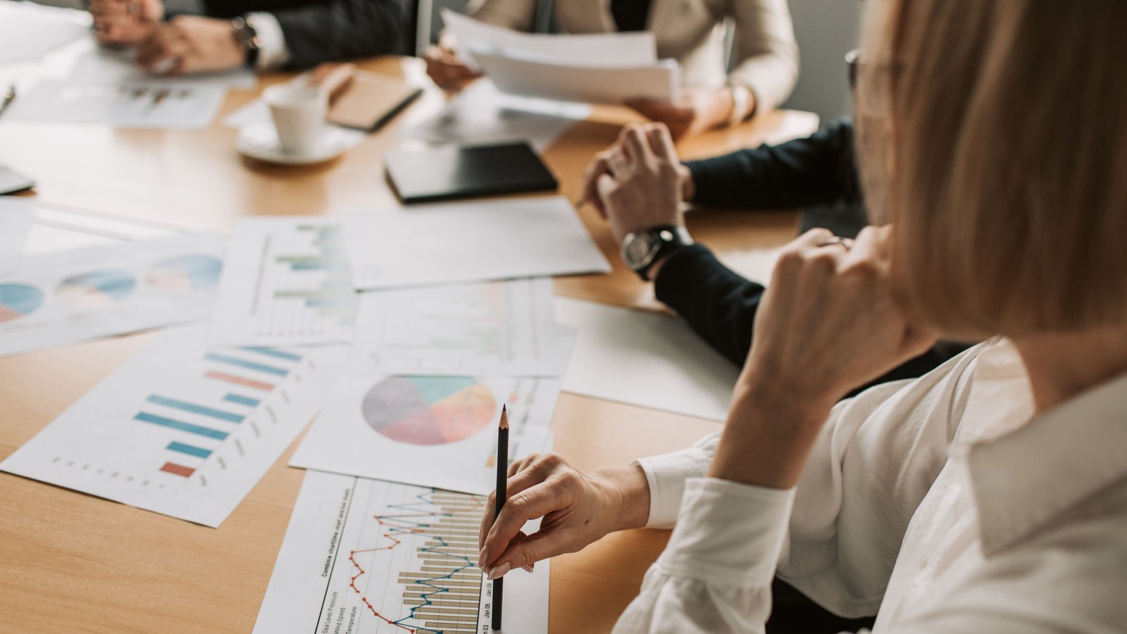 Founders reviewing financial projections in a meeting room